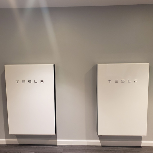 A picture of a Tesla Powerwall installed in Abington, MA - Mass Renewables Inc. 
